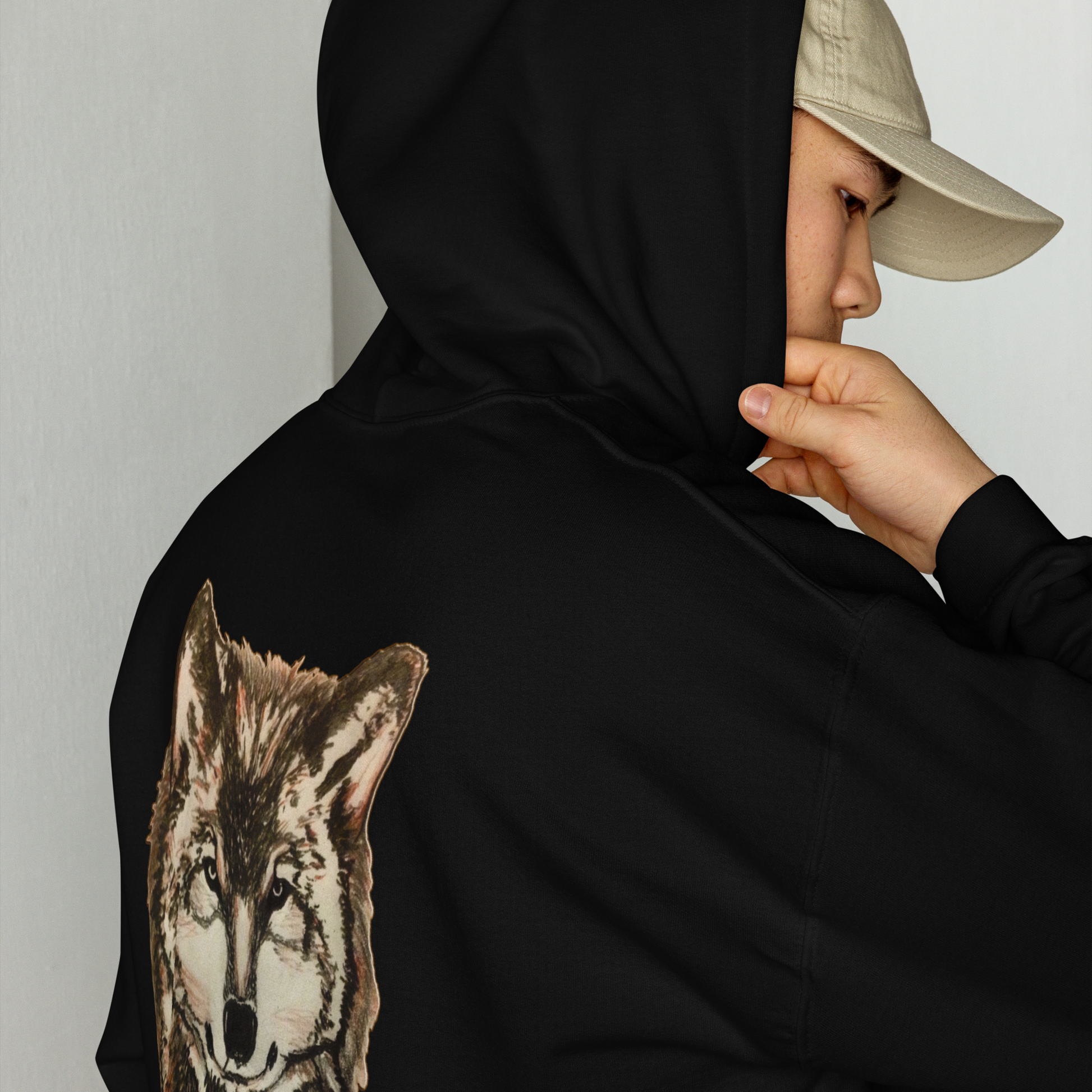Alpha Wolf dark art hoodie lifestyle shot - back view, hand-drawn wolf husky artwork on black unisex hoodie