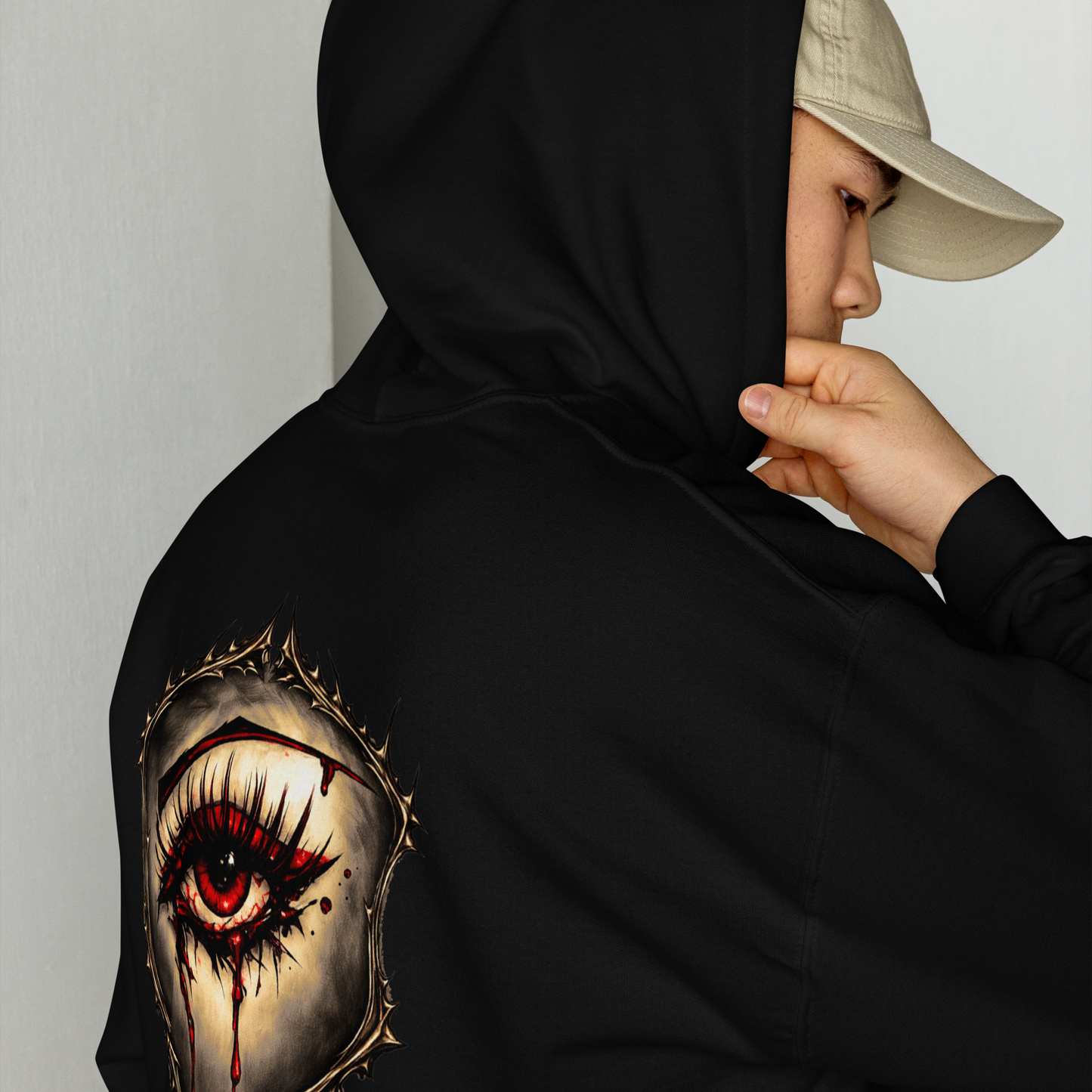 Bleeding Eye gothic hoodie black on model back - dark art eye graphic streetwear
