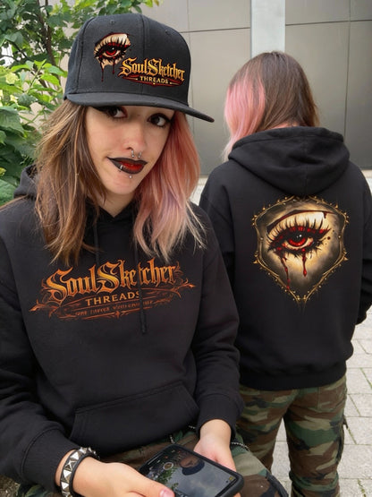 Bleeding Eye gothic hoodie black on female model split front/ back view - alt gothic streetwear